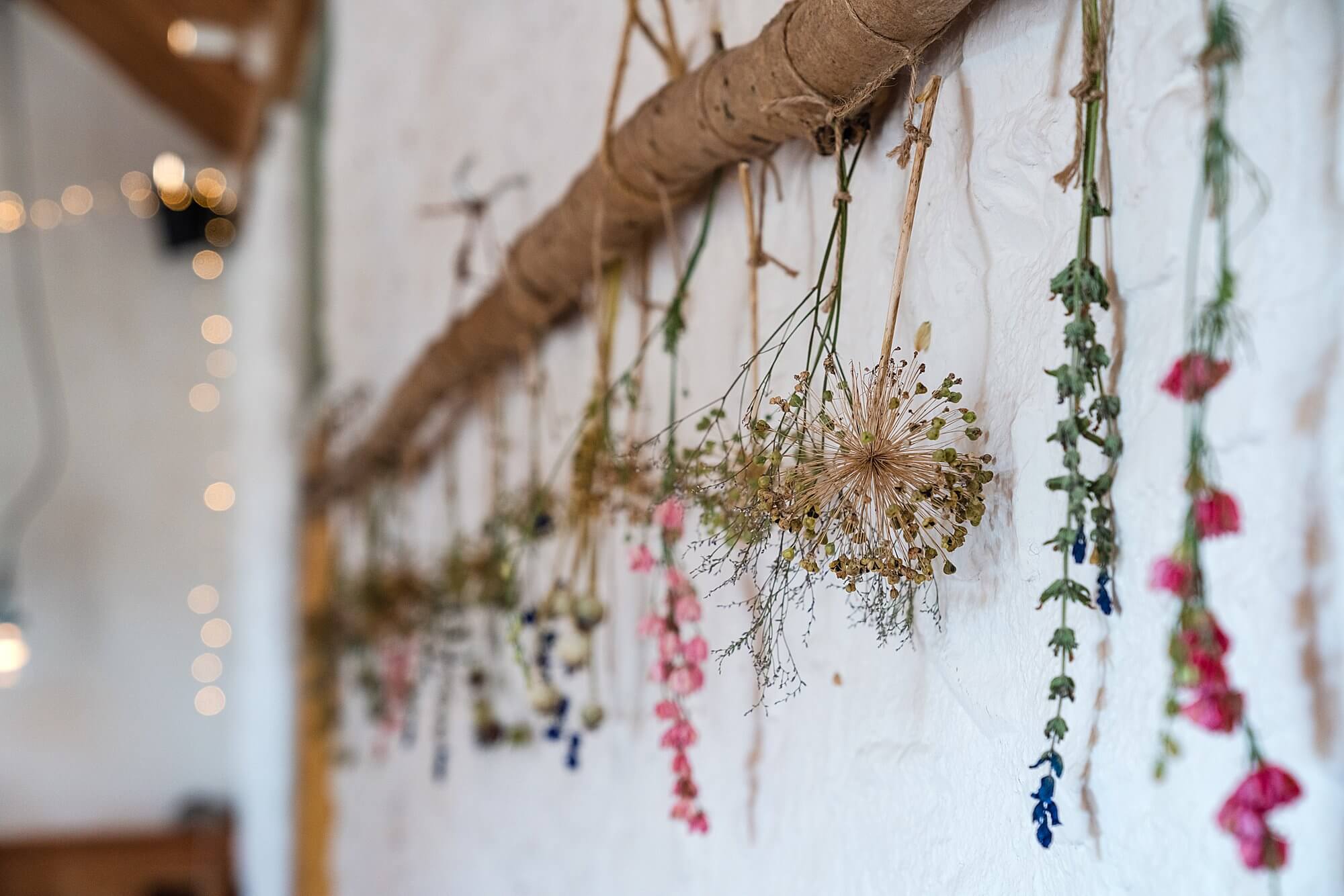 flowers drying against whitewashed wall park farm river cottage hq